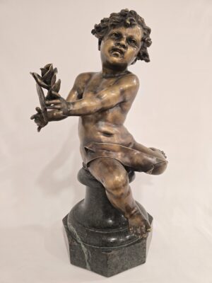 Putto grande de bronce