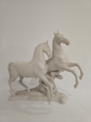 Pareja de caballos al galope